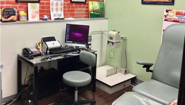 Exam room with adjustable exam chair